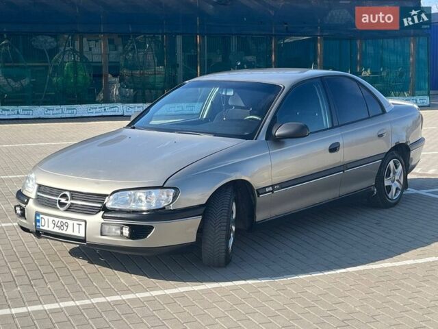 Бежевый Опель Омега, объемом двигателя 2 л и пробегом 328 тыс. км за 1500 $, фото 1 на Automoto.ua