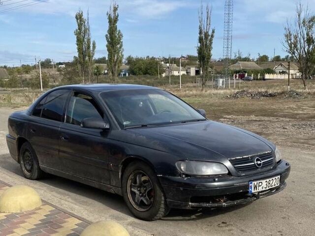 Черный Опель Омега, объемом двигателя 0 л и пробегом 300 тыс. км за 24 $, фото 1 на Automoto.ua