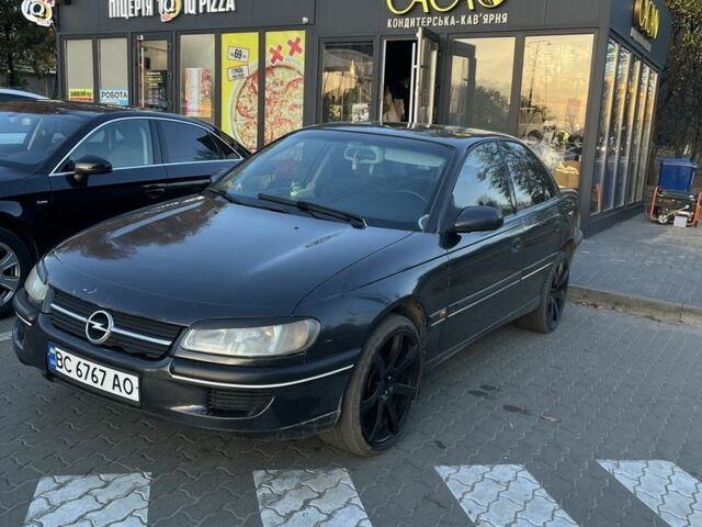 Черный Опель Омега, объемом двигателя 2.5 л и пробегом 200 тыс. км за 2600 $, фото 1 на Automoto.ua