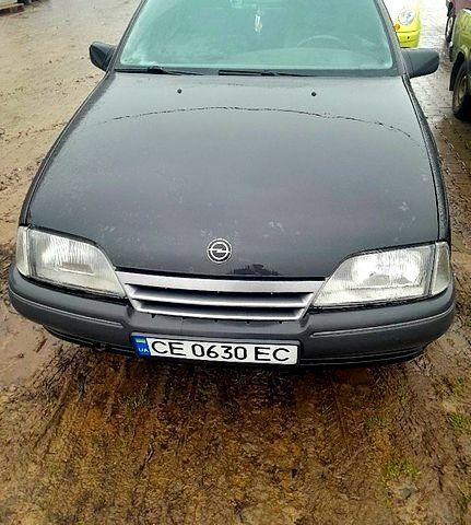 Черный Опель Омега, объемом двигателя 2 л и пробегом 100 тыс. км за 500 $, фото 1 на Automoto.ua