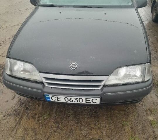 Чорний Опель Омега, об'ємом двигуна 2 л та пробігом 100 тис. км за 450 $, фото 1 на Automoto.ua