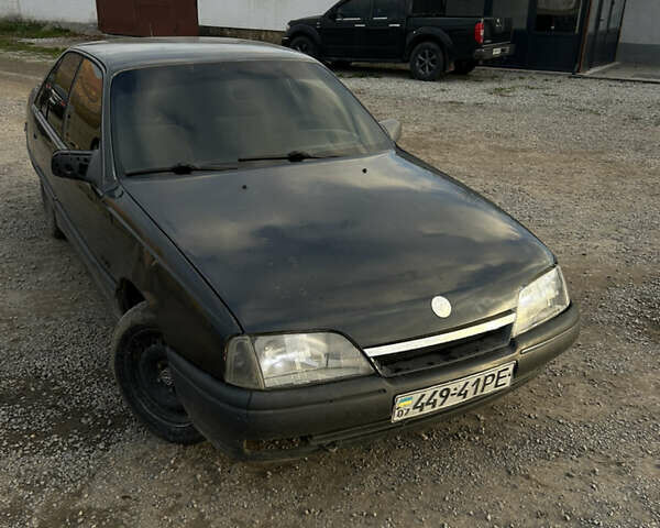 Черный Опель Омега, объемом двигателя 2 л и пробегом 320 тыс. км за 999 $, фото 1 на Automoto.ua