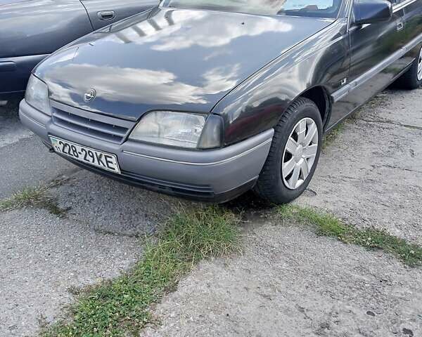 Черный Опель Омега, объемом двигателя 1.8 л и пробегом 275 тыс. км за 1500 $, фото 1 на Automoto.ua