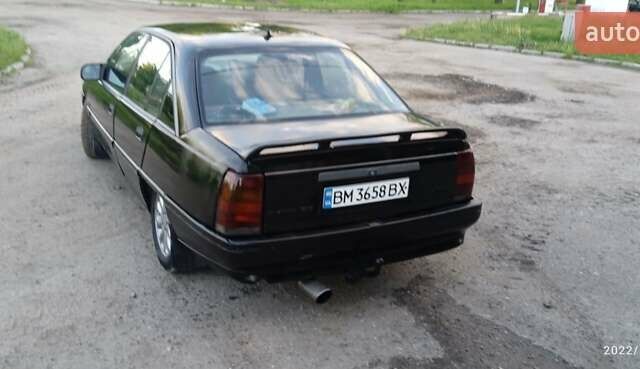 Черный Опель Омега, объемом двигателя 2 л и пробегом 100 тыс. км за 1078 $, фото 1 на Automoto.ua