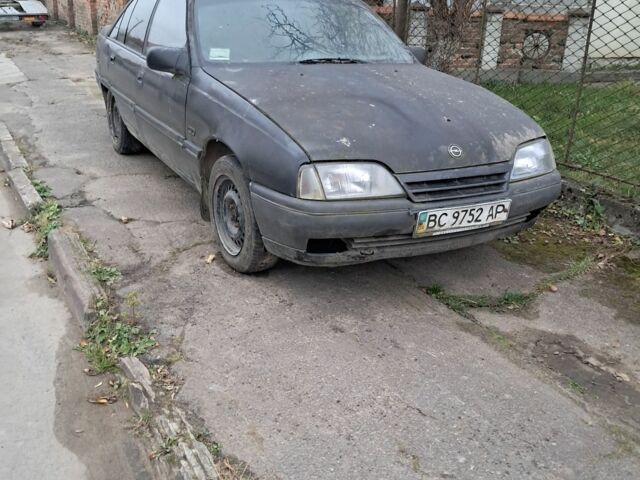 Черный Опель Омега, объемом двигателя 2 л и пробегом 400 тыс. км за 350 $, фото 1 на Automoto.ua