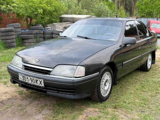Черный Опель Омега, объемом двигателя 2.3 л и пробегом 300 тыс. км за 1250 $, фото 1 на Automoto.ua