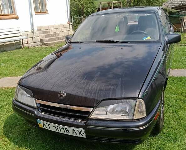 Черный Опель Омега, объемом двигателя 2.2 л и пробегом 250 тыс. км за 1500 $, фото 1 на Automoto.ua