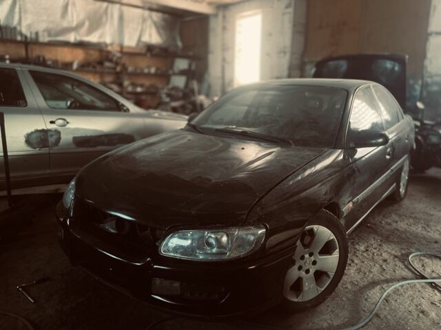 Чорний Опель Омега, об'ємом двигуна 2.5 л та пробігом 47 тис. км за 2000 $, фото 1 на Automoto.ua