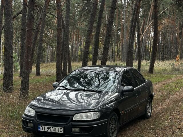 Черный Опель Омега, объемом двигателя 2.5 л и пробегом 334 тыс. км за 2486 $, фото 1 на Automoto.ua