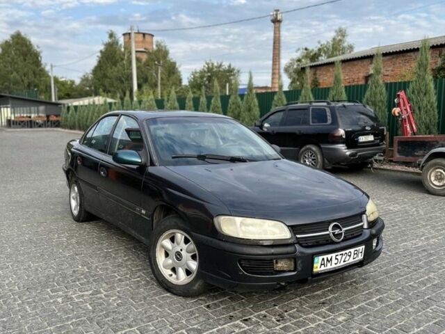 Чорний Опель Омега, об'ємом двигуна 2.5 л та пробігом 288 тис. км за 2100 $, фото 1 на Automoto.ua