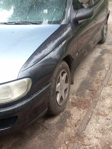 Черный Опель Омега, объемом двигателя 2 л и пробегом 380 тыс. км за 1700 $, фото 1 на Automoto.ua