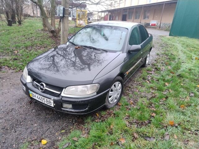 Чорний Опель Омега, об'ємом двигуна 2.5 л та пробігом 350 тис. км за 1650 $, фото 1 на Automoto.ua