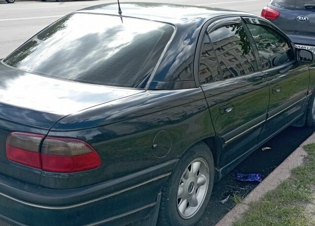 Чорний Опель Омега, об'ємом двигуна 2.5 л та пробігом 317 тис. км за 1700 $, фото 1 на Automoto.ua