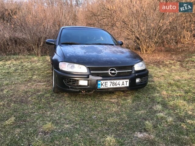 Черный Опель Омега, объемом двигателя 2.5 л и пробегом 330 тыс. км за 1350 $, фото 1 на Automoto.ua