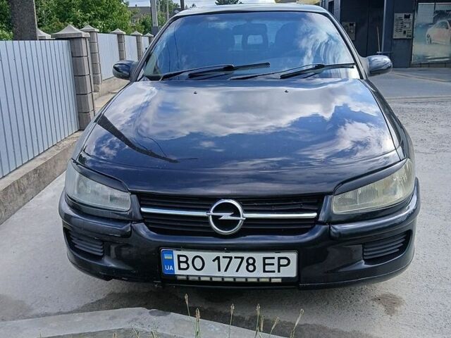 Чорний Опель Омега, об'ємом двигуна 2 л та пробігом 142 тис. км за 1700 $, фото 1 на Automoto.ua
