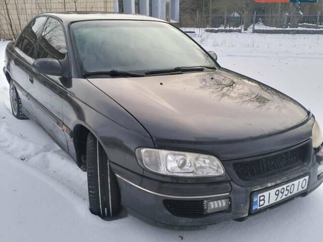 Чорний Опель Омега, об'ємом двигуна 2.5 л та пробігом 300 тис. км за 1800 $, фото 1 на Automoto.ua