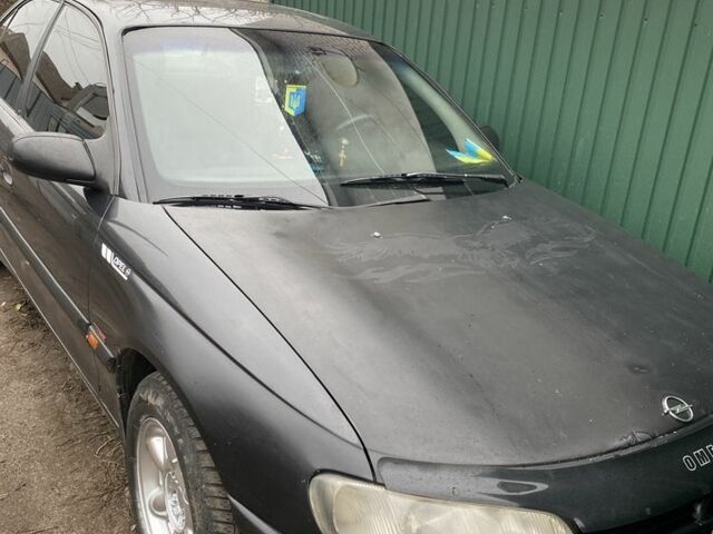 Чорний Опель Омега, об'ємом двигуна 2.5 л та пробігом 370 тис. км за 1655 $, фото 1 на Automoto.ua