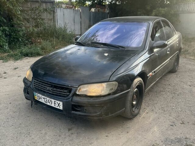 Чорний Опель Омега, об'ємом двигуна 2.5 л та пробігом 267 тис. км за 550 $, фото 1 на Automoto.ua