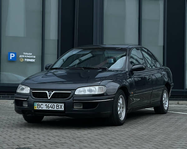 Черный Опель Омега, объемом двигателя 2.5 л и пробегом 300 тыс. км за 2200 $, фото 1 на Automoto.ua