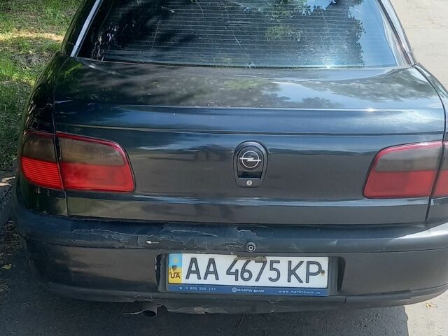 Чорний Опель Омега, об'ємом двигуна 0 л та пробігом 380 тис. км за 1900 $, фото 1 на Automoto.ua