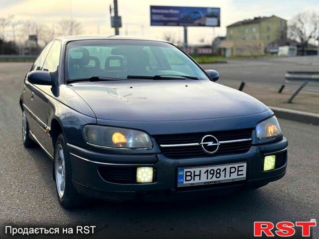 Черный Опель Омега, объемом двигателя 2.5 л и пробегом 250 тыс. км за 1500 $, фото 1 на Automoto.ua