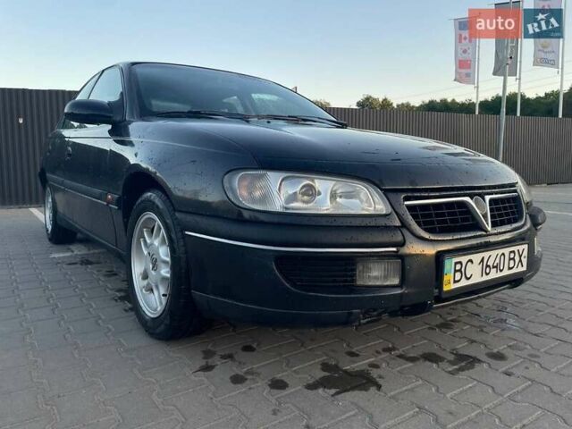 Чорний Опель Омега, об'ємом двигуна 2.5 л та пробігом 311 тис. км за 1950 $, фото 1 на Automoto.ua