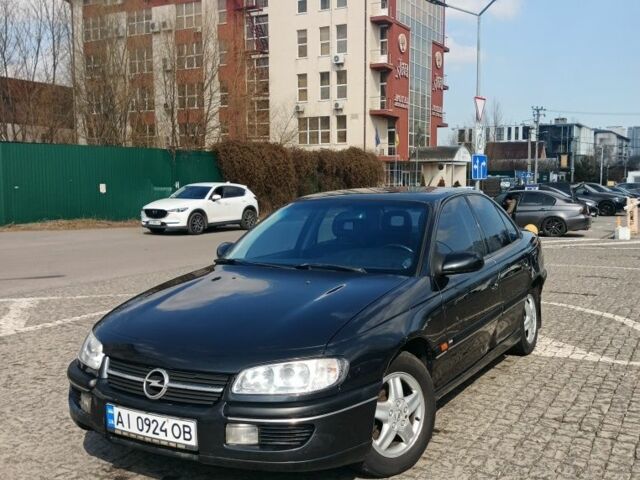 Черный Опель Омега, объемом двигателя 3 л и пробегом 292 тыс. км за 2300 $, фото 1 на Automoto.ua