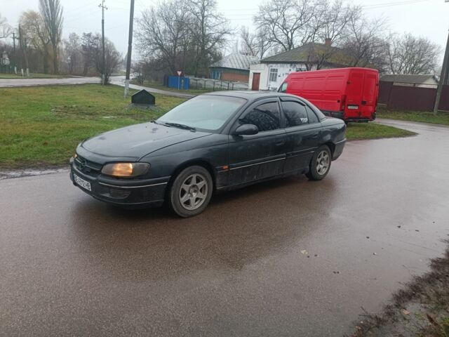 Черный Опель Омега, объемом двигателя 2 л и пробегом 300 тыс. км за 1500 $, фото 1 на Automoto.ua