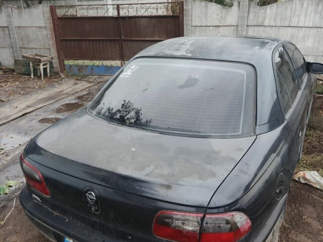 Черный Опель Омега, объемом двигателя 2 л и пробегом 370 тыс. км за 850 $, фото 1 на Automoto.ua
