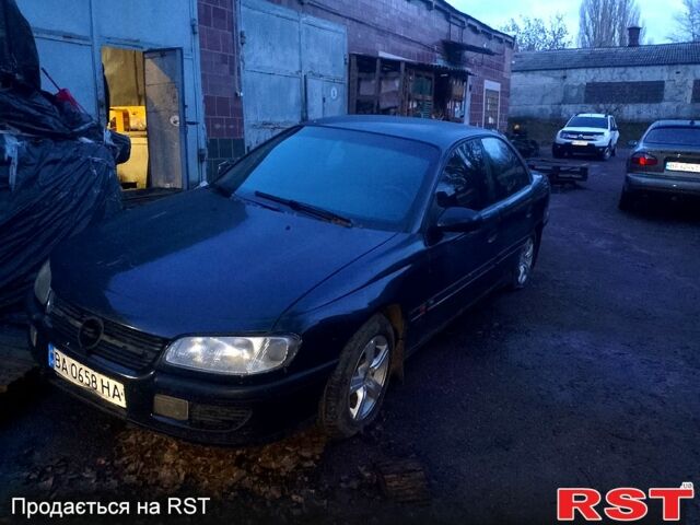 Черный Опель Омега, объемом двигателя 2 л и пробегом 167 тыс. км за 900 $, фото 1 на Automoto.ua