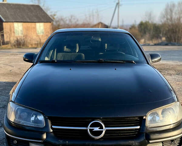 Чорний Опель Омега, об'ємом двигуна 2 л та пробігом 320 тис. км за 2198 $, фото 1 на Automoto.ua