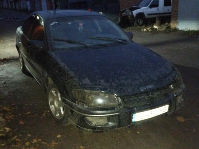 Черный Опель Омега, объемом двигателя 2 л и пробегом 300 тыс. км за 750 $, фото 1 на Automoto.ua