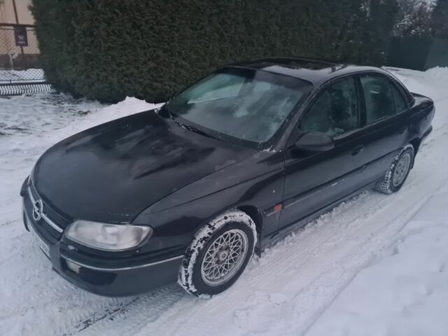 Чорний Опель Омега, об'ємом двигуна 2 л та пробігом 231 тис. км за 1299 $, фото 1 на Automoto.ua