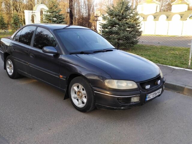 Чорний Опель Омега, об'ємом двигуна 2.5 л та пробігом 400 тис. км за 2100 $, фото 1 на Automoto.ua