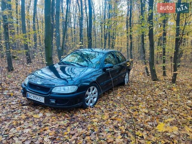 Черный Опель Омега, объемом двигателя 2 л и пробегом 350 тыс. км за 2800 $, фото 1 на Automoto.ua