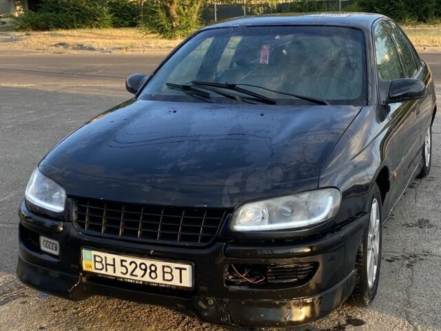 Чорний Опель Омега, об'ємом двигуна 3 л та пробігом 170 тис. км за 1700 $, фото 1 на Automoto.ua