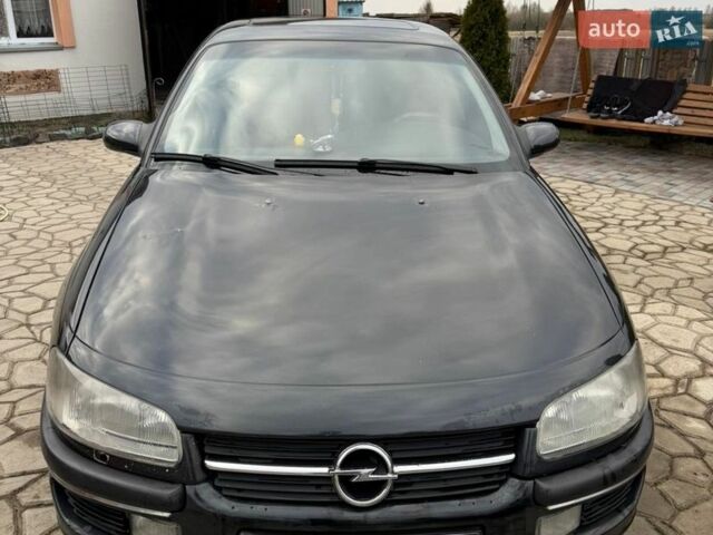 Чорний Опель Омега, об'ємом двигуна 2 л та пробігом 300 тис. км за 2000 $, фото 1 на Automoto.ua