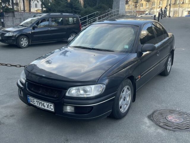 Чорний Опель Омега, об'ємом двигуна 2 л та пробігом 302 тис. км за 3000 $, фото 1 на Automoto.ua
