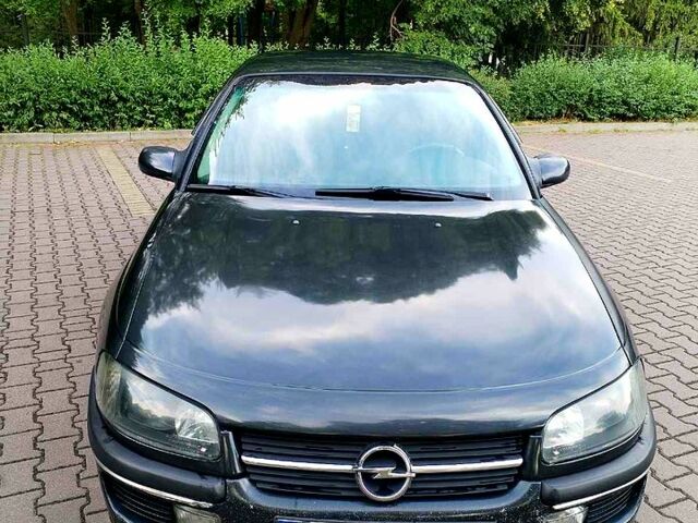 Чорний Опель Омега, об'ємом двигуна 2 л та пробігом 200 тис. км за 2300 $, фото 1 на Automoto.ua
