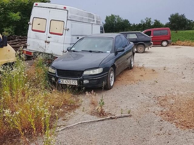 Чорний Опель Омега, об'ємом двигуна 2.5 л та пробігом 300 тис. км за 800 $, фото 1 на Automoto.ua