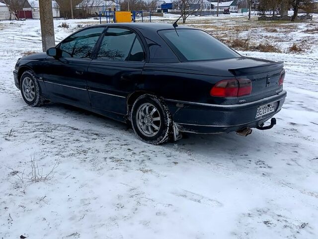 Черный Опель Омега, объемом двигателя 2 л и пробегом 400 тыс. км за 1300 $, фото 1 на Automoto.ua