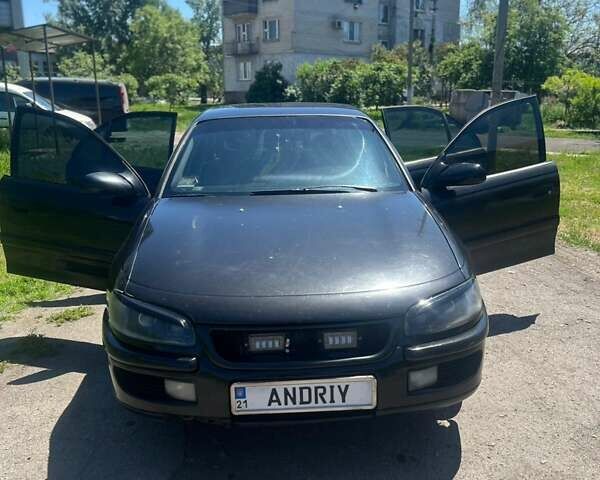 Черный Опель Омега, объемом двигателя 2 л и пробегом 381 тыс. км за 3000 $, фото 1 на Automoto.ua
