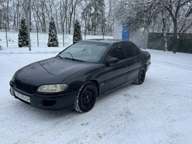 Черный Опель Омега, объемом двигателя 2 л и пробегом 250 тыс. км за 1300 $, фото 1 на Automoto.ua