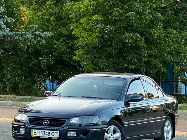 Чорний Опель Омега, об'ємом двигуна 2 л та пробігом 366 тис. км за 2400 $, фото 1 на Automoto.ua
