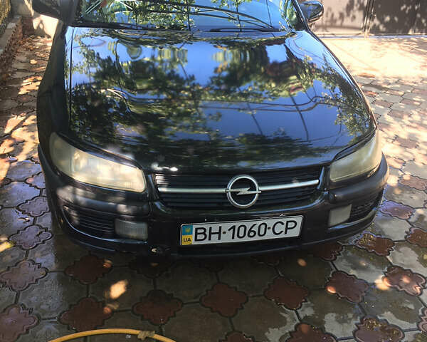 Чорний Опель Омега, об'ємом двигуна 2 л та пробігом 400 тис. км за 2300 $, фото 1 на Automoto.ua