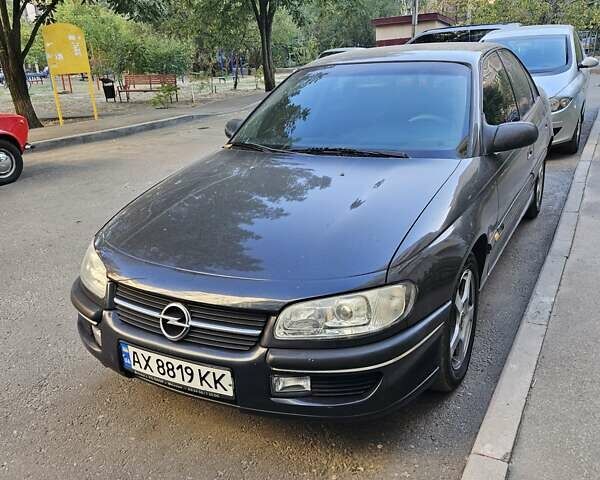 Черный Опель Омега, объемом двигателя 2 л и пробегом 336 тыс. км за 3500 $, фото 1 на Automoto.ua
