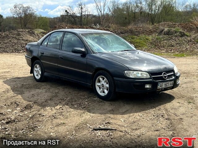 Черный Опель Омега, объемом двигателя 2.5 л и пробегом 150 тыс. км за 999 $, фото 1 на Automoto.ua
