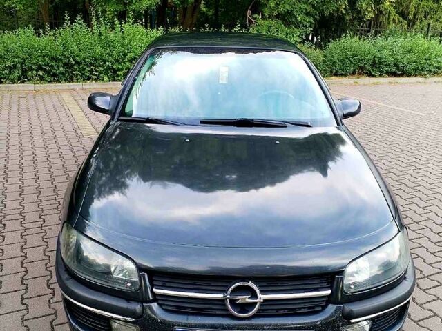 Черный Опель Омега, объемом двигателя 2 л и пробегом 360 тыс. км за 1950 $, фото 1 на Automoto.ua