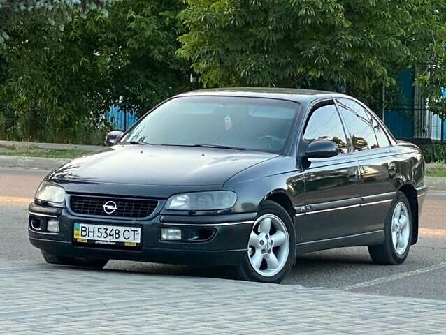 Чорний Опель Омега, об'ємом двигуна 2 л та пробігом 365 тис. км за 2700 $, фото 1 на Automoto.ua