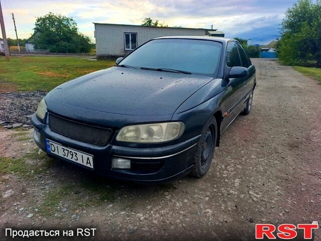 Черный Опель Омега, объемом двигателя 3 л и пробегом 216 тыс. км за 870 $, фото 1 на Automoto.ua